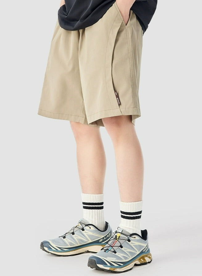 Panel-Pleat Pocketed Bermuda Shorts