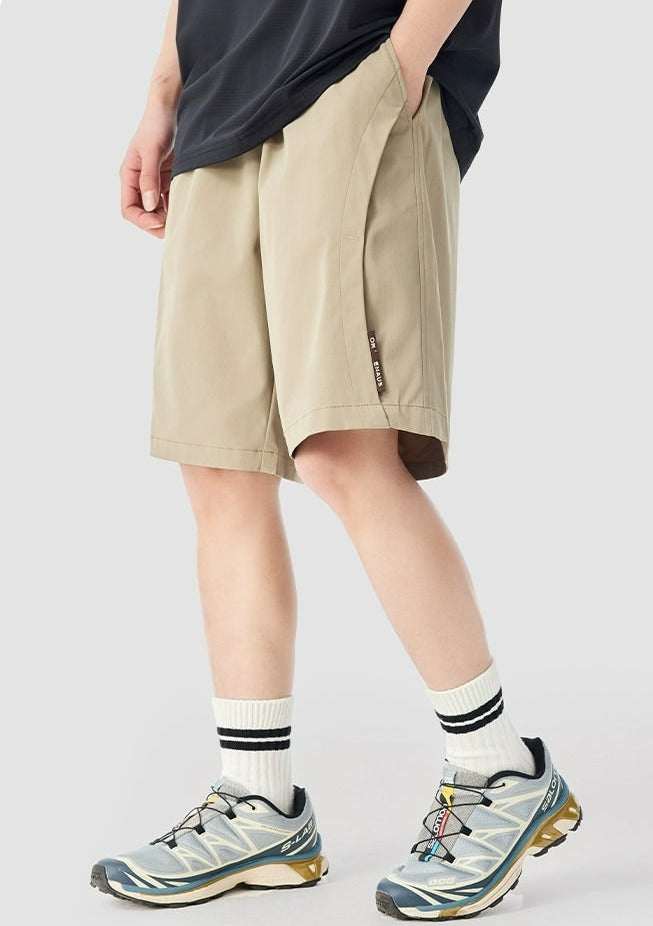 Panel-Pleat Pocketed Bermuda Shorts